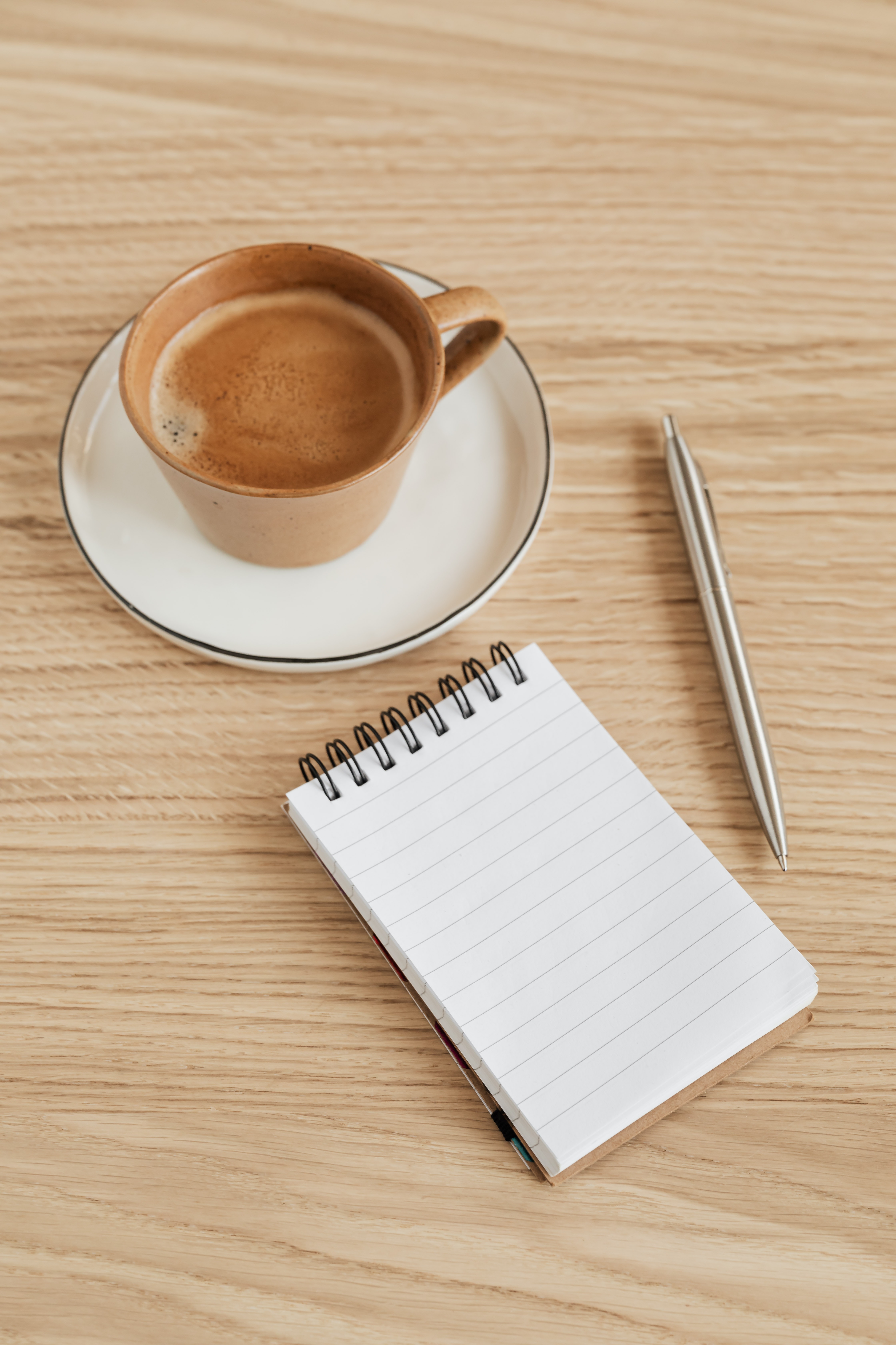 Coffee Cup with notepad and pen